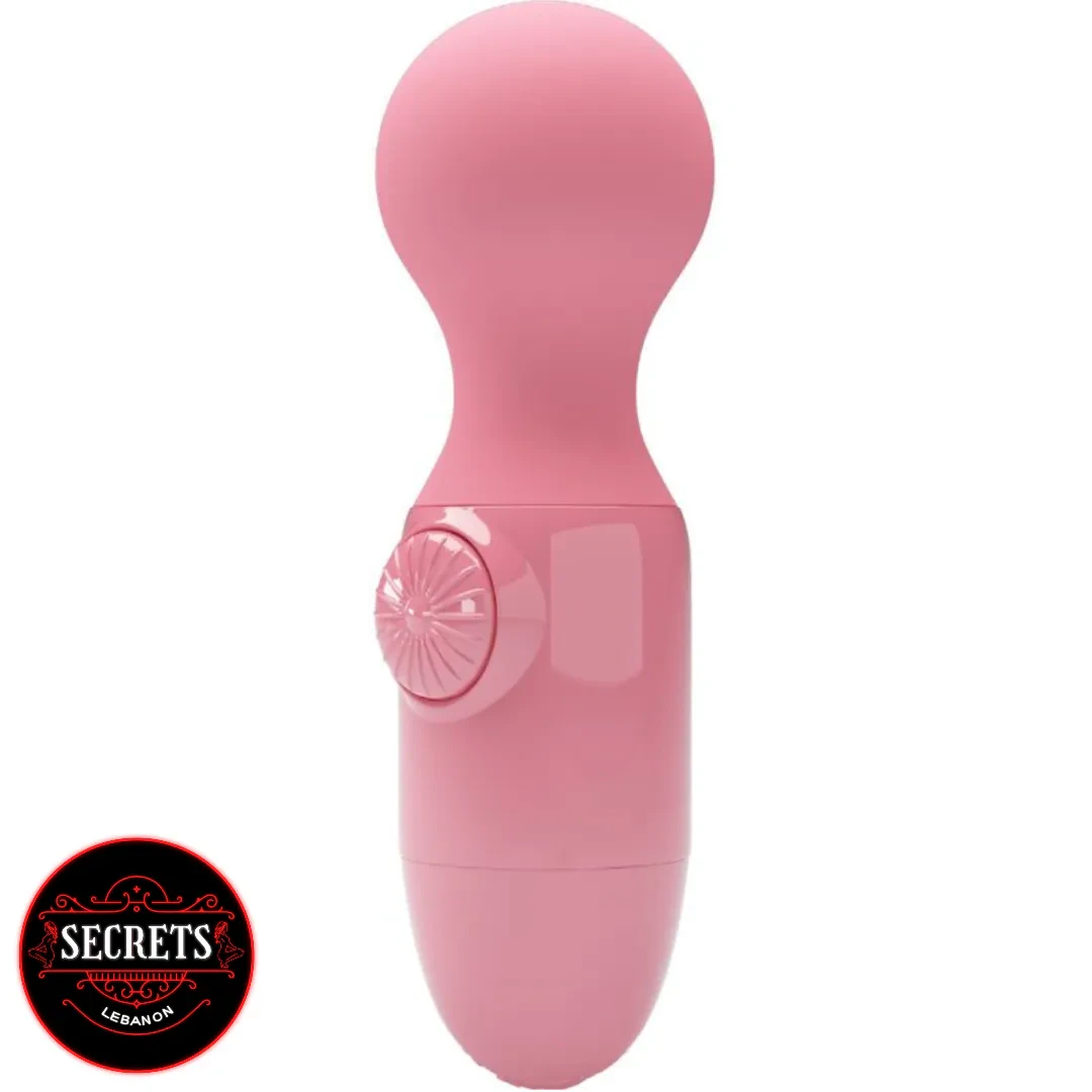 Wonder Mini Stick Vibrator in pink with rounded head and control button