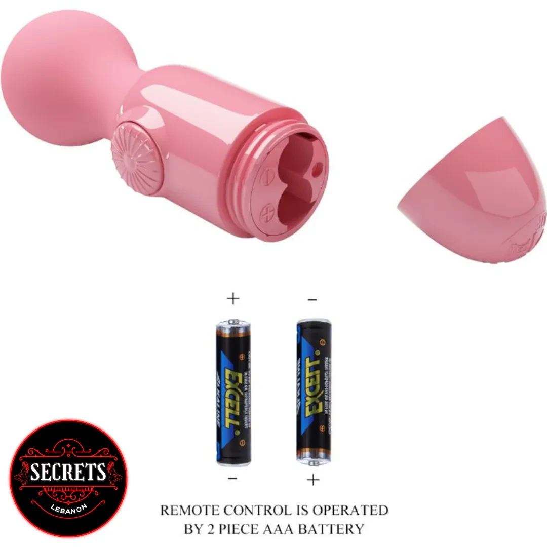 Wonder Mini Stick Vibrator pink with open battery compartment and two AAA batteries